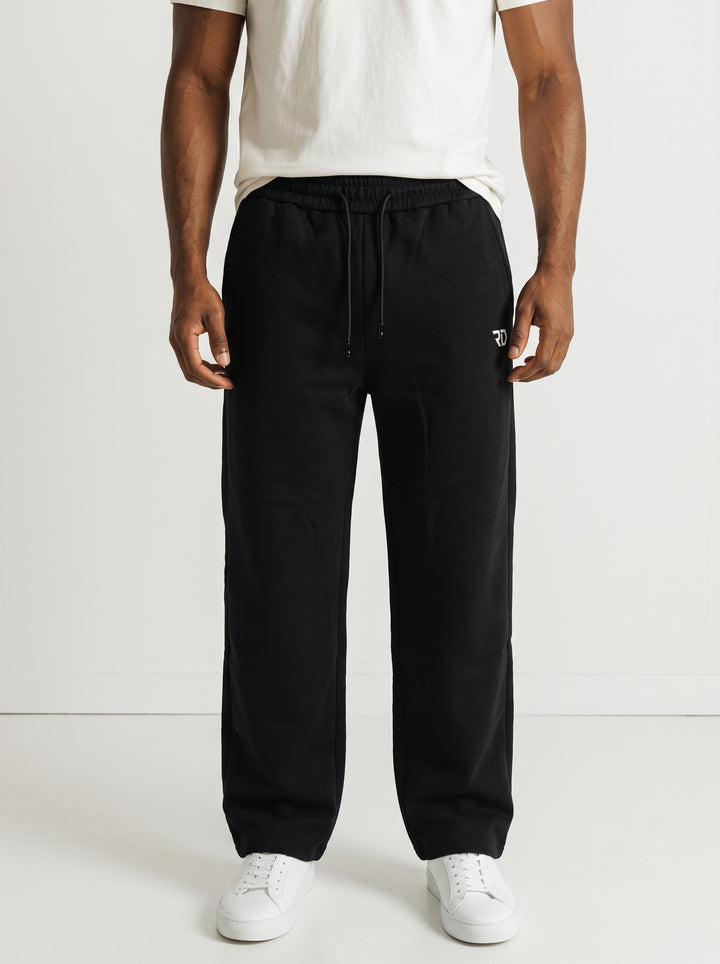 ESSENTIAL BAGGY – Pantaloni Tuta Uomo a Gamba Larga Nero