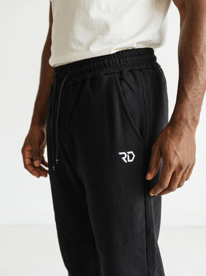 ESSENTIAL BAGGY – Pantaloni Tuta Uomo a Gamba Larga Nero