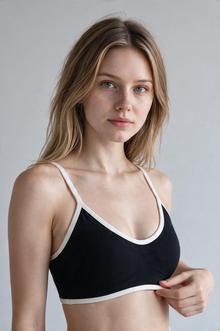 ESSENTIAL SCULPT – Top Sportivo con Spalline Regolabili Nero